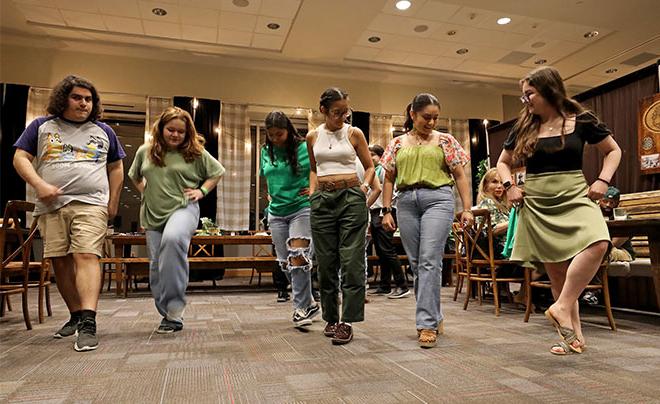 Attendees dancing